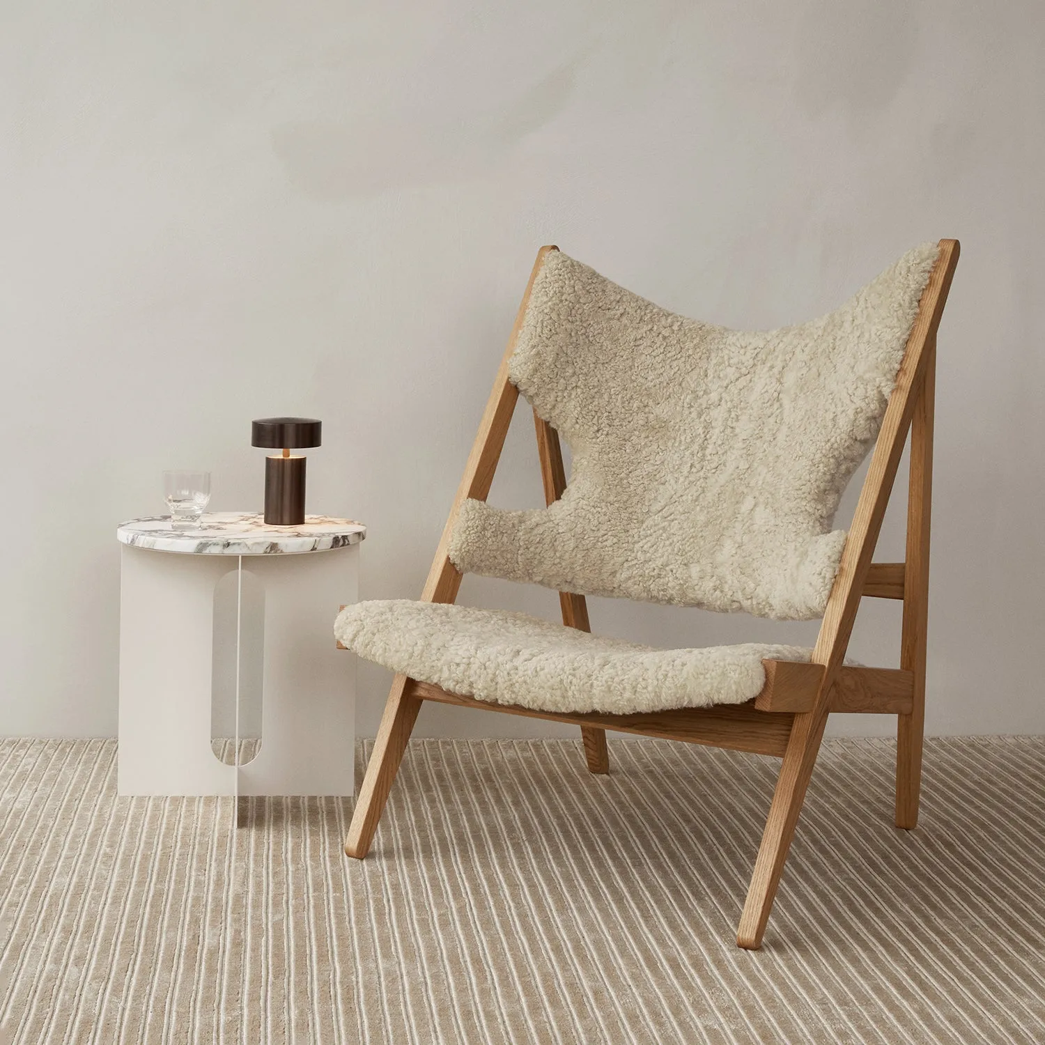 audo copenhagen (menu) | knitting lounge chair | sheepskin nature   natural oak base