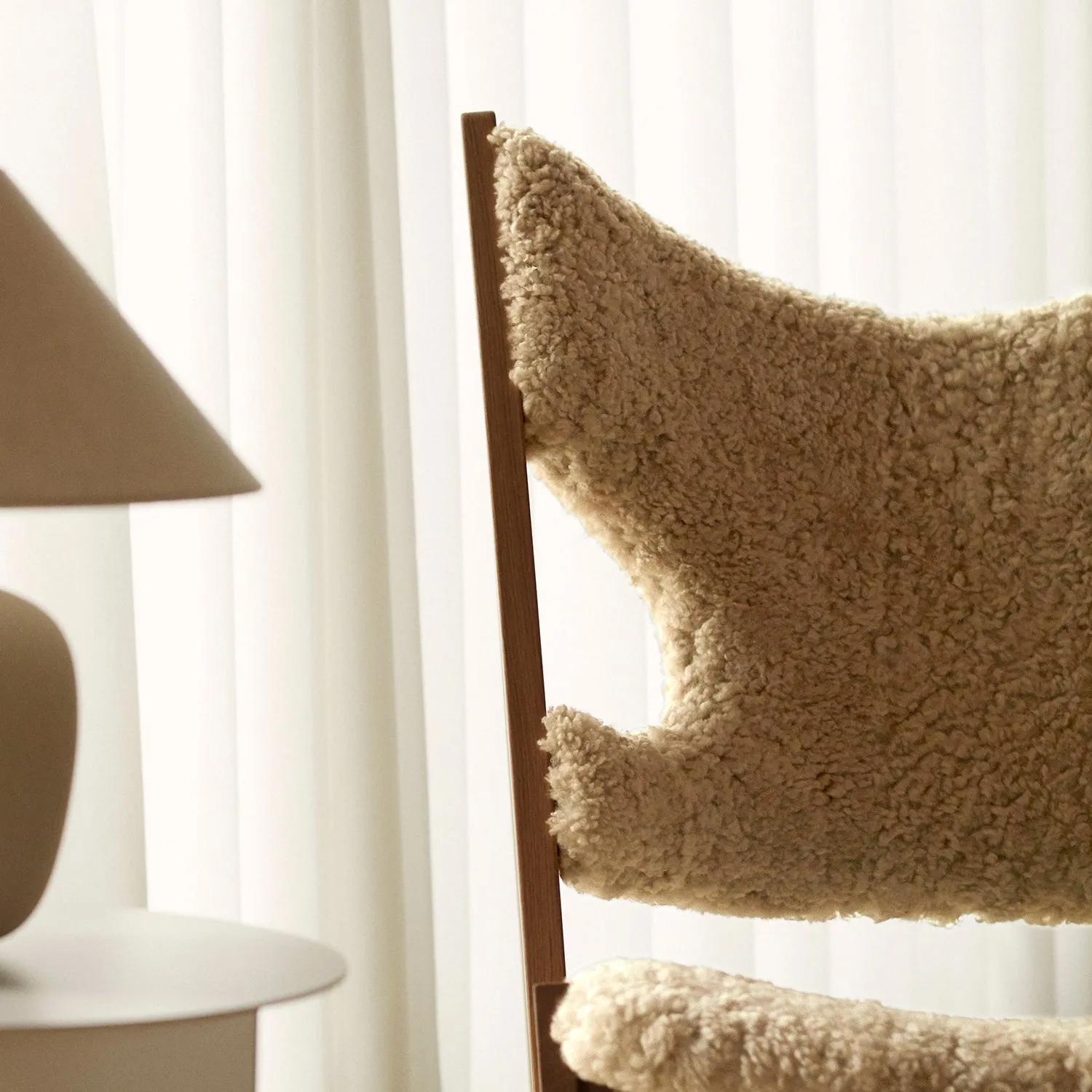 audo copenhagen (menu) | knitting lounge chair | sheepskin nature   natural oak base